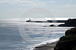 Ships, lighthouse, beach silhouettes, Seaham