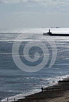 Ships, lighthouse, beach silhouettes, Seaham