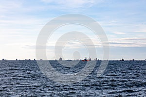 Ships are moored in the Black Sea waiting for passage through the Bosphorus Strait