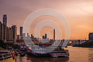 Ships moored in Chongqing town dock at dusk