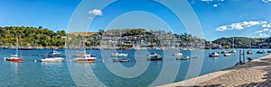 Ships moored in Dartmouth harbour looking towards Kingswear, Devon, England, UK