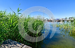 Ships moored at Fleesen Lake jetty in GÃ¶hren-Lebbin Germany