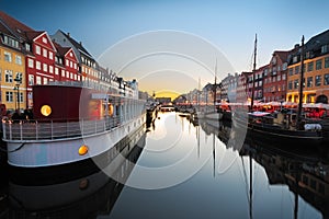 Ships in Nyhavn at sunset, Copenhagen, Denmark