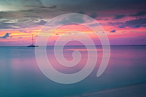 Ships at peaceful sunset on Caribbean sea of Aruba, Dutch Antilles