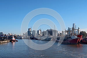 Ships at the port harbor of Buenos Aires, cityscape in the background, Argentina, South America