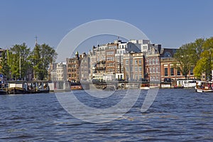 Ships on the river Amstel in Amsterdam