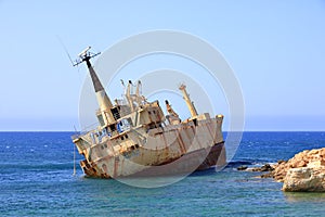 Shipwreck of the abandoned ship Edro III on a rocky coast at Akrotiri Beach in Cyprus