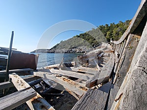 shipwreck on the beach of agalypa of skyros in greece pine trees clear transparent water in the sea