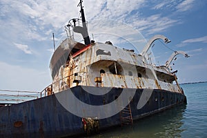 Shipwreck on Black sea coast. Ship brought ashore