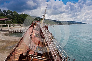 Shipwreck on Black sea coast. Ship brought ashore