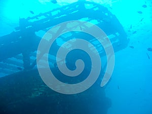 Shipwreck at the bottom of the ocean