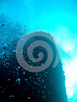 Shipwreck at the bottom of the ocean