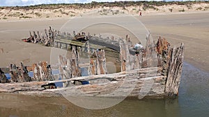 Shipwreck on the Cefn Sands beach at Pembrey Country Park in Carmarthenshire South Wales