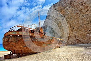 Shipwreck on the Navagio Beach - Zakynthos Island, landmark attraction in Greece. Ionian Sea. Seascape photo