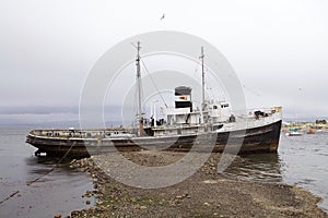 Shipwreck in the port of Ushuaia, Argentina photo