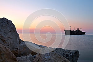 Shipwreck and rocks on the seashore in Costinesti, Romania