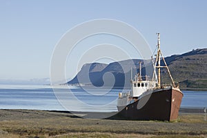 Shipwreck shore beach trawler in Westfjords Icelan