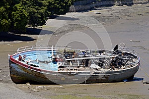 Shipwrecked boat on a beach
