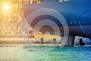 Shipyard Cargo ship moored alongside in the sea