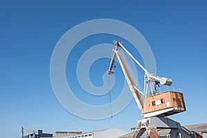 Shipyard cranes or portal cranes at logistic river harbour port .