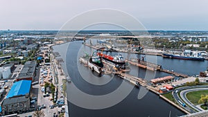 Tanker vessel repair in dry dock Shipyard, Drone shot