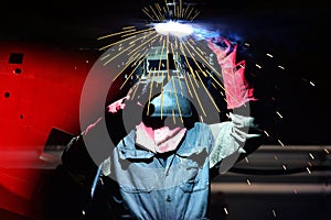 Shipyard worker welding ship repair under water ballast tank