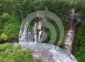 Shirahige Waterfalls and the Blue River in Biei, Hokkaido