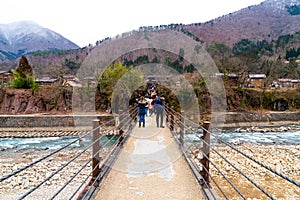 Shirakawa-go, Japan - Jan 12, 2020: Tourists visiting Shirakawa-go. Shirakawa-go is one of Japan\'s UNESCO World Heritage Sites