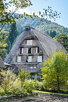 Shirakawa Traditional and Historical Japanese village Shirakawago in autumn. House build by wooden with roof gassho zukuri style.