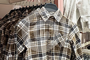 Shirt. Clothing store. Casual clothes. Textile industry. Retail trade