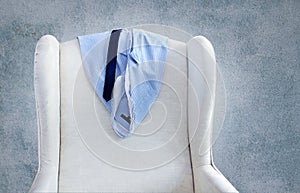 Shirt hanging on a chair