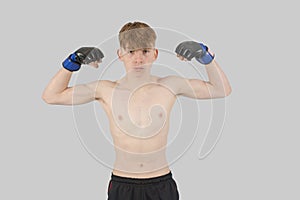 Shirtless male teenage MMA fighter photo