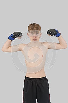 Shirtless male teenage MMA fighter photo