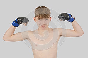 Shirtless male teenage MMA fighter photo