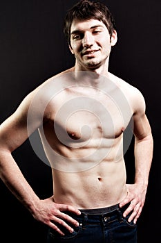 Shirtless man with muscular abdomen