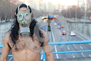 Shirtless man wearing retro pollution mask