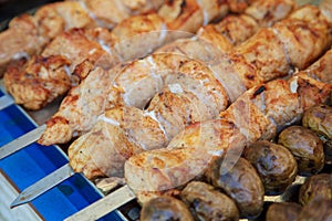 Shish kebab from chicken meat roasted on a grill