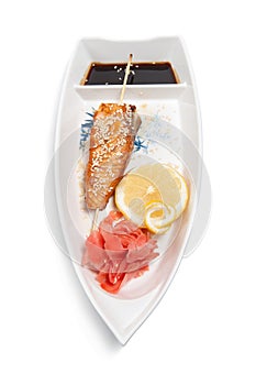 Shish kebab on a plate in the form of a boat