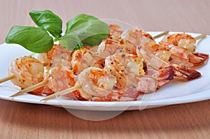 Shish Kebab from Shrimps on dish photo