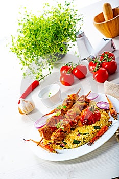 Shish kebabs with vegetables and bulgur