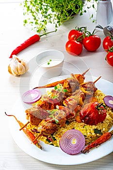 Shish kebabs with vegetables and bulgur