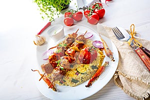 Shish kebabs with vegetables and bulgur