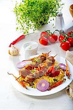 Shish kebabs with vegetables and bulgur