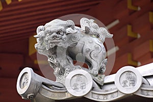 Shishi, mythical lion-dog  placed on the roof to scare off evil. Nara, Japan