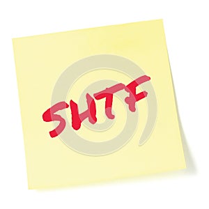 Shit Hits The Fan initialism SHTF red marker written text preppers notice, societal collapse preparedness concept, isolated yellow