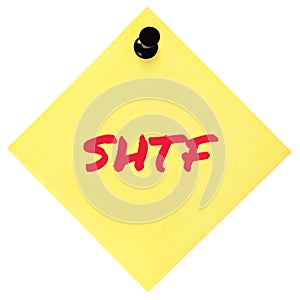 Shit Hits The Fan initialism SHTF red marker written text preppers notice, societal collapse preparedness concept, isolated yellow photo
