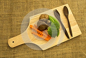 Shitake mushroom,broccoli and green pea on wooden board