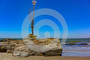 Shiva's face and Trident totem on Vagator beach, Goa, India. The northernmost beach of Bardez Taluka in Goa. March