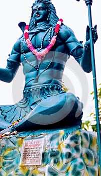 A shivji statue of a temple.