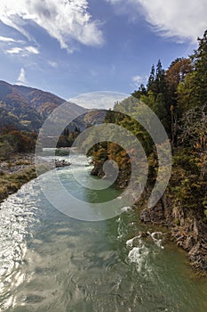 Sho River landscape at the historic Village of Ogimachi in Shirakawago, World Heritage Site, Japan.